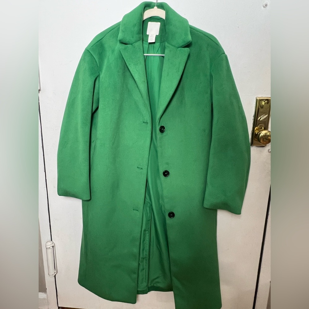 Green woman’s oversized peacoat from H&M.